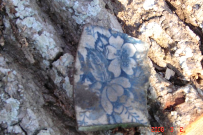 A piece of pottery found in the debris.  Can we use it to date the site? 