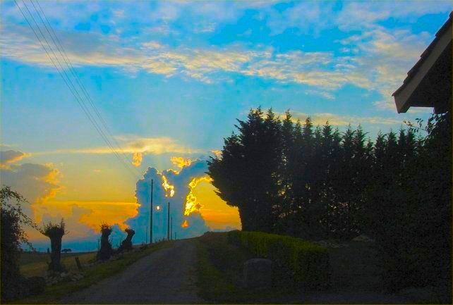 Cumulo-Nimbus cloud in the distance at sunset.