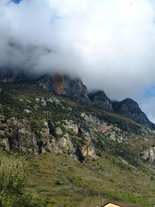 On the way to Andorra, the Pyrenees rising into the clouds.