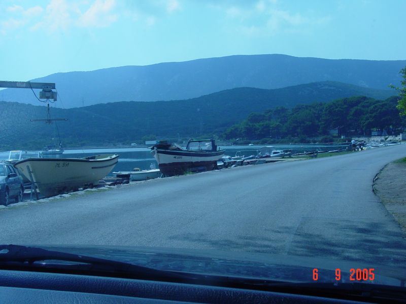 The road descends to water level and we soon cross the bridge between the island of Cres and the island of Losinj.
