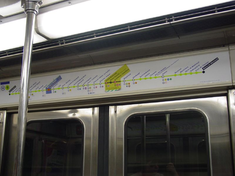 The maps in the Metro cars show the route of that particular car.  Every station is a circle, and you always know when your stop is next.  Everything is color coded so you know which stations have connecting lines.